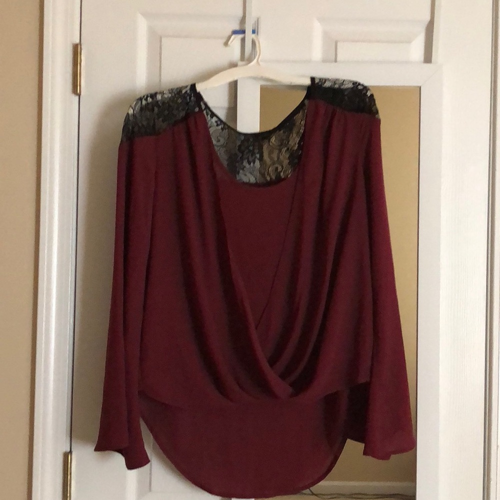 Maroon blouse with black lace detail on top